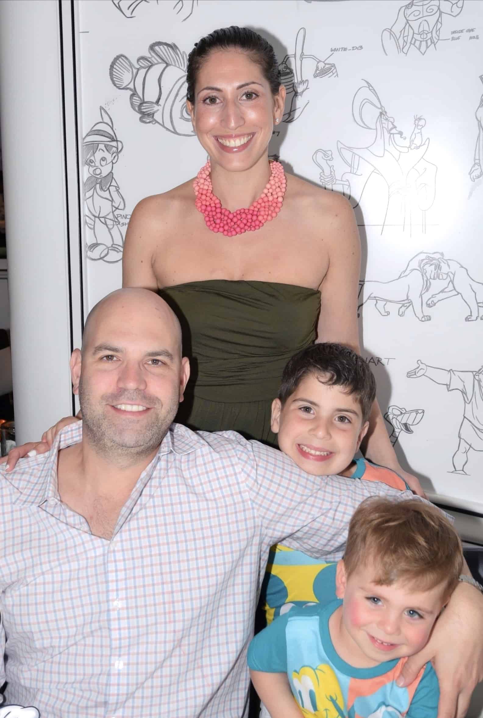 Two parents and their young children: Alyssa and David Kresman with children William, age 3, and Alexander age 6.