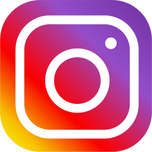 An image of the instagram logo, a colorful box with white lines drawn inside, made to look like a camera.