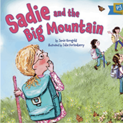 A book cover titled: Sadie and the Big Mountain. Sadie holds a walking stick and covers her mouth as she gazes up at the tall mountain she is about to climb. She is wearing a backpack and glasses and her friends in front of her have already begun to climb.