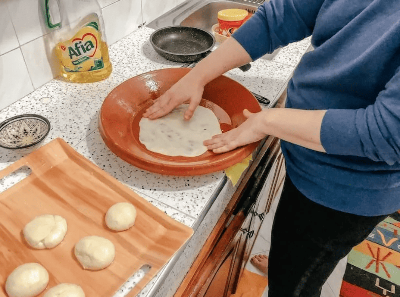 An arts and crafts projects to make an edible campfire: fruit roll ups for the red of the fire, pretzels for the sticks that hold up the fire, and m&m's for the rocks surrounding the base of the fire.